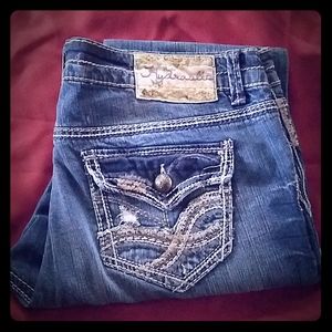 Hydraulic distressed jeans